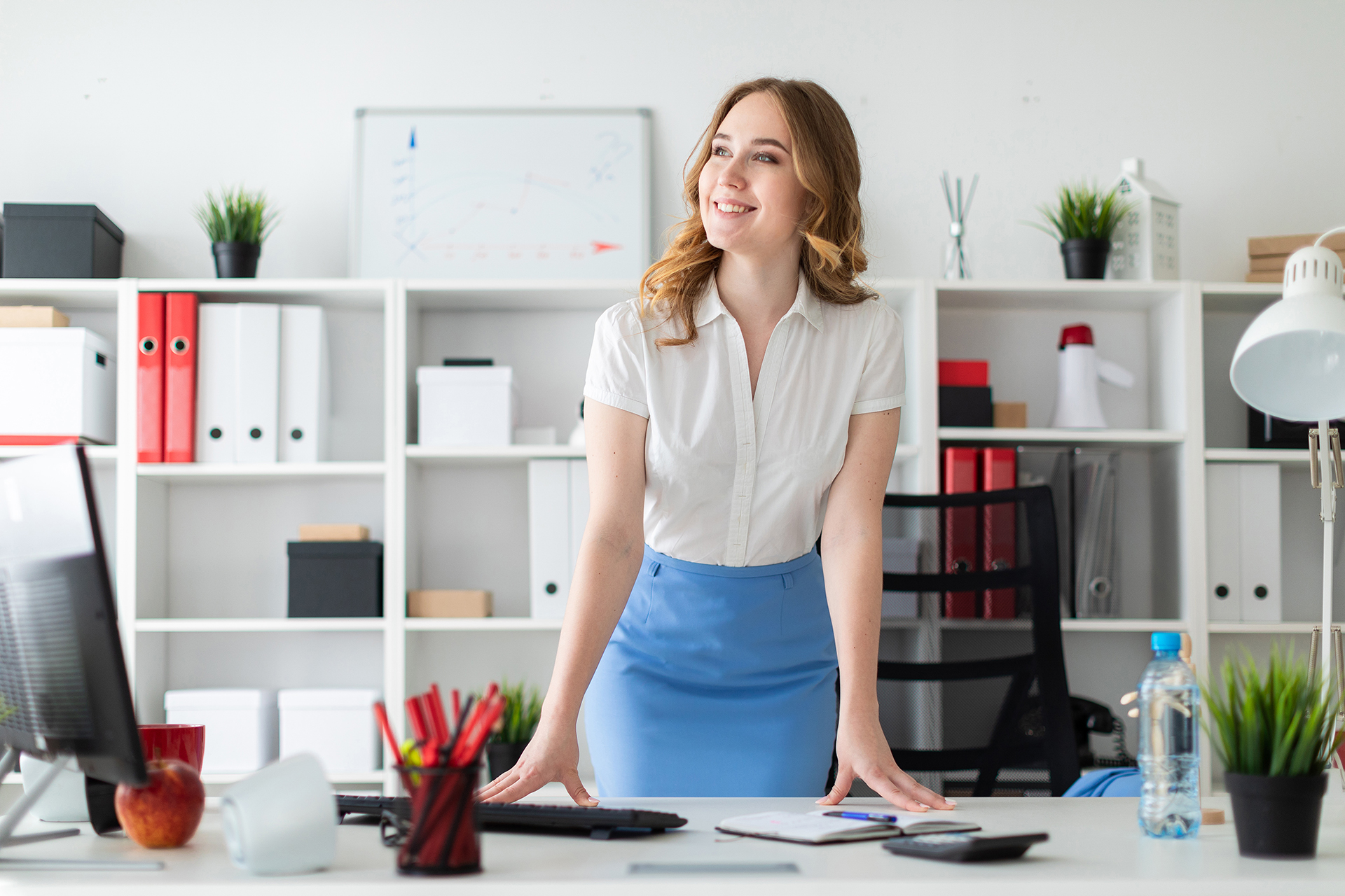 Happy female professional who completed her insurance adjuster continuing education