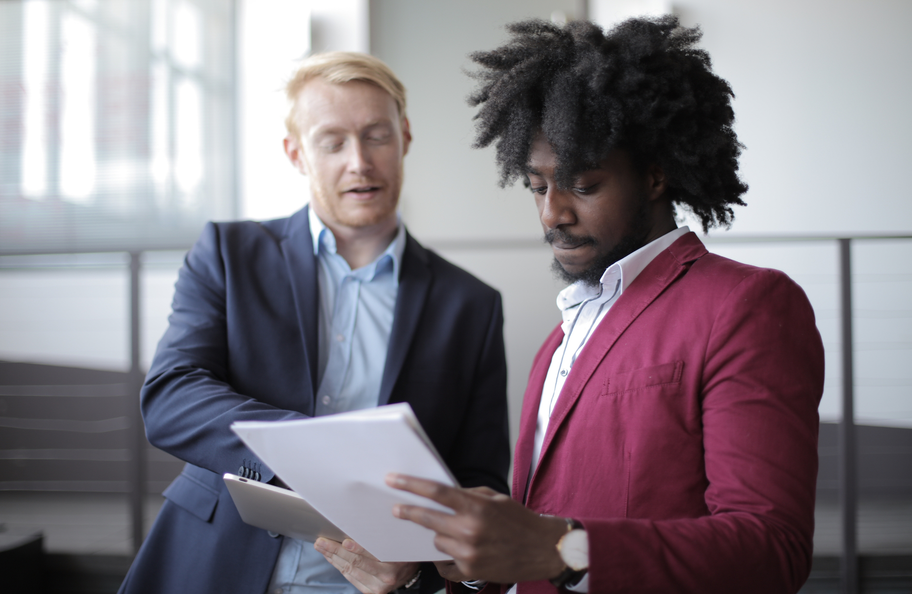 Men researching the Louisiana real estate license requirements