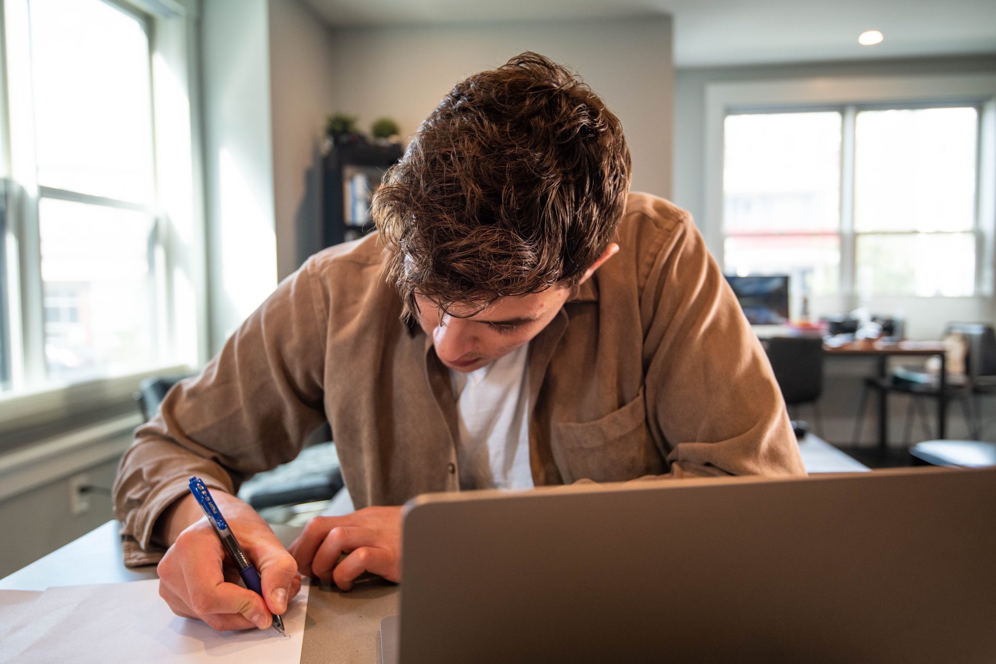 Man studying for an online real estate course